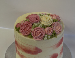 Swiss meringue buttercream cake course with individually piped flowers
