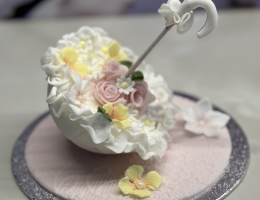 Mini parasol cake with ruffles & roses