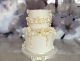 4-week two tier stacked cake with very pretty flowers