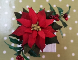 Poinsettia and holly wired arrangement