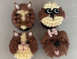 Piped animal cupcakes