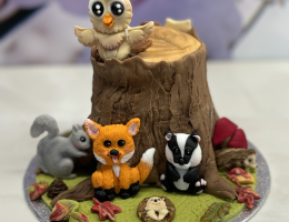 Mini tree stump cake with moulded animals
