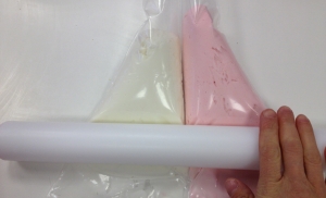 How to pipe a two tone rose swirl using strawberry & champagne frosting